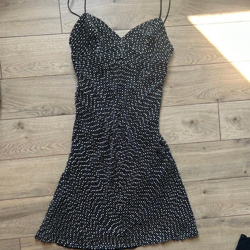 Fully beaded black silk dress